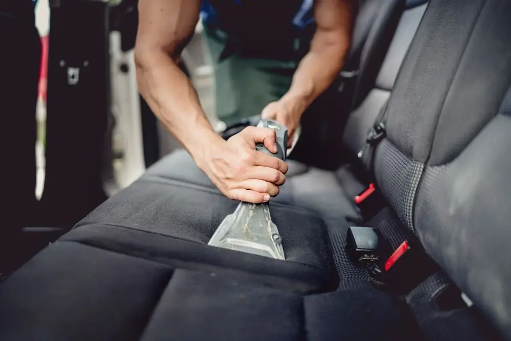 Car interior detailing service cleaning dashboard seats and floor mats